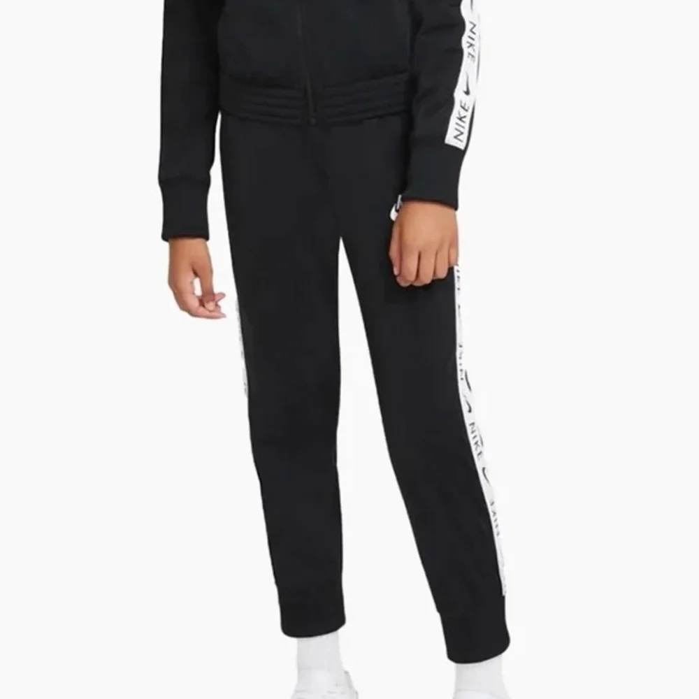 Nike Kid’s‎ Size Large Heritage Track Pants Black White Logo Side Stripe